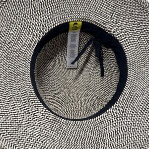Sunday afternoon,  Black and White Woven Sun Hat where functionality meet style